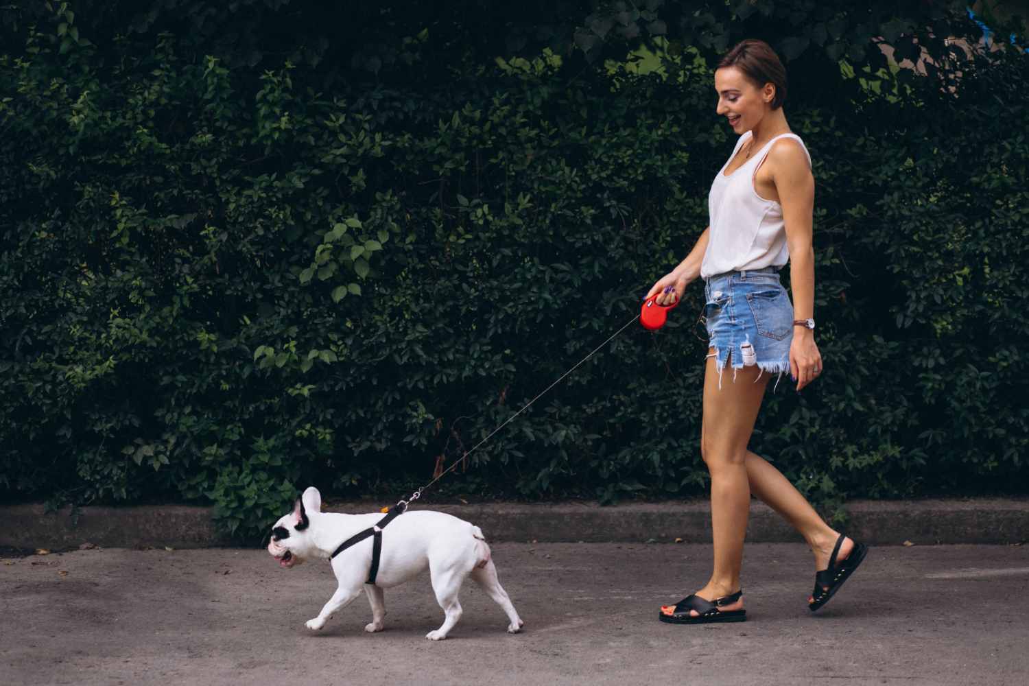 Woman power walking with dog