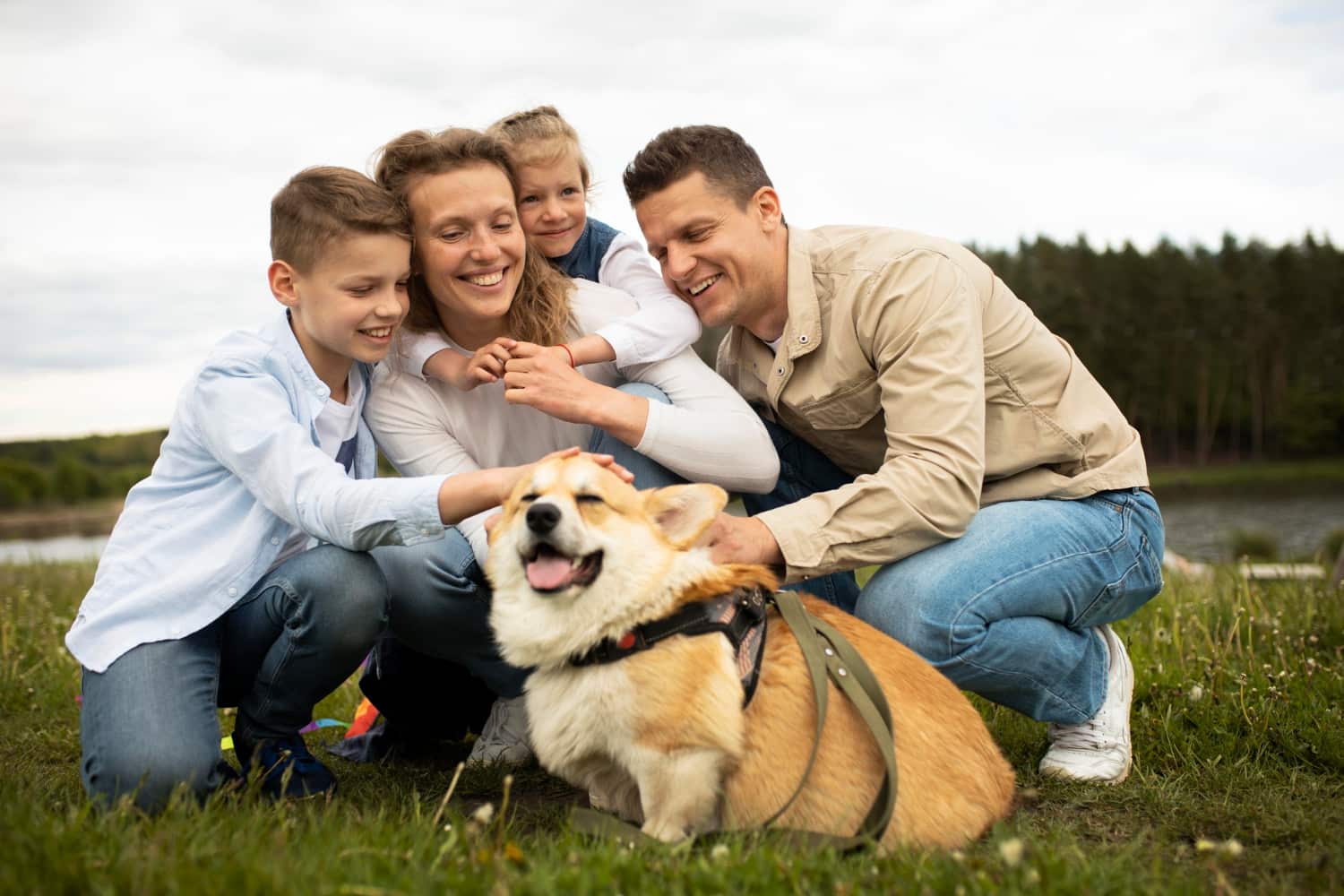 full-shot-family-with-cute-dog-outdoors